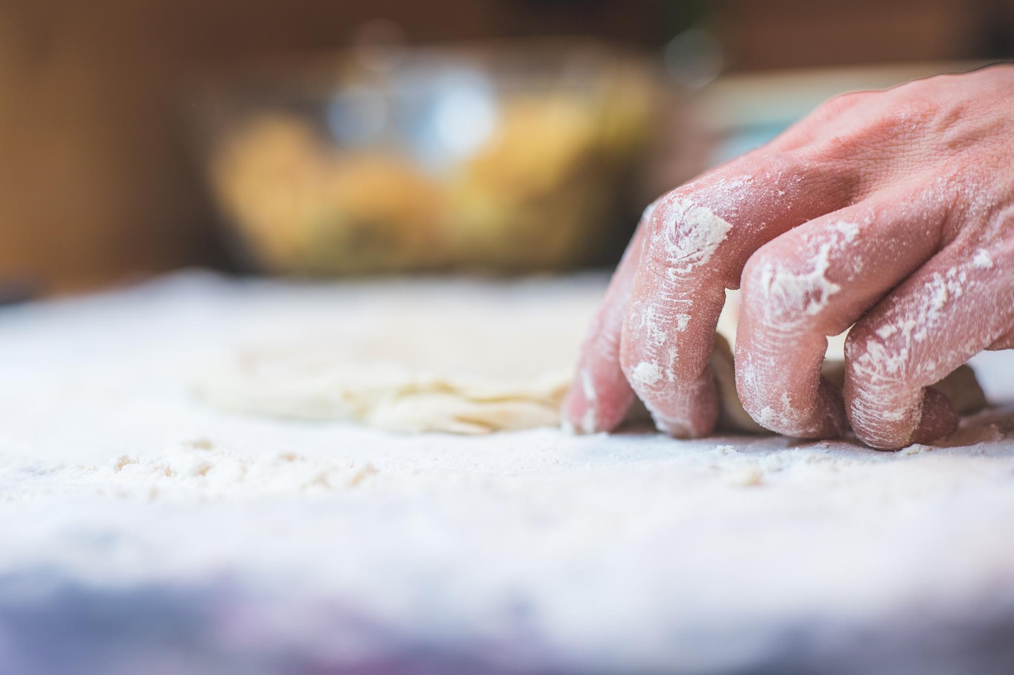 Hands kneading dough